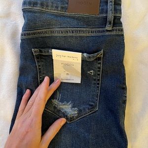 Skinny high rise denim, NWT. Size 31, 27 inch inseam.Lightly destroyed. Stretch.